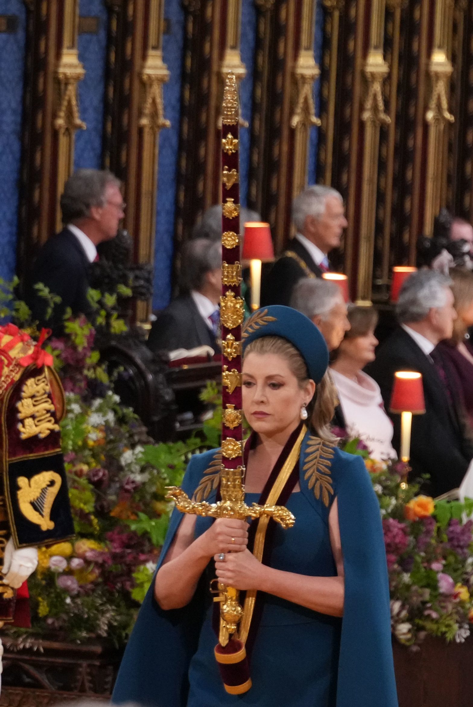 Penny Mourdant holding the coronation sword