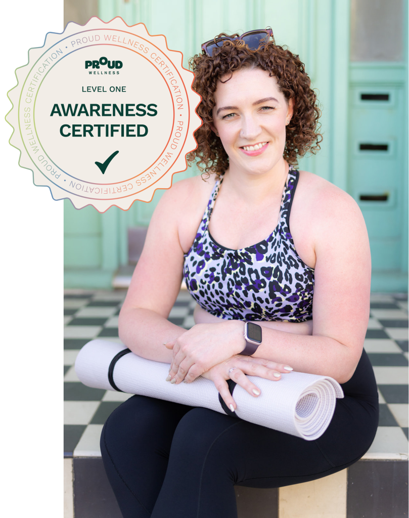 Horsham-based female personal trainer Becky Hughes with curly hair in purple gym wear