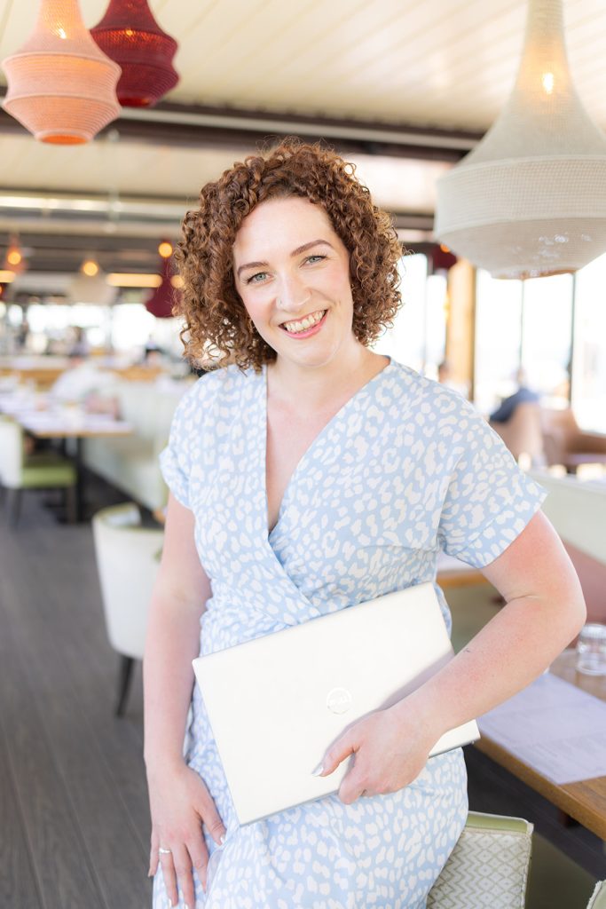 Female personal trainer with curly hair, based in Horsham West Sussex