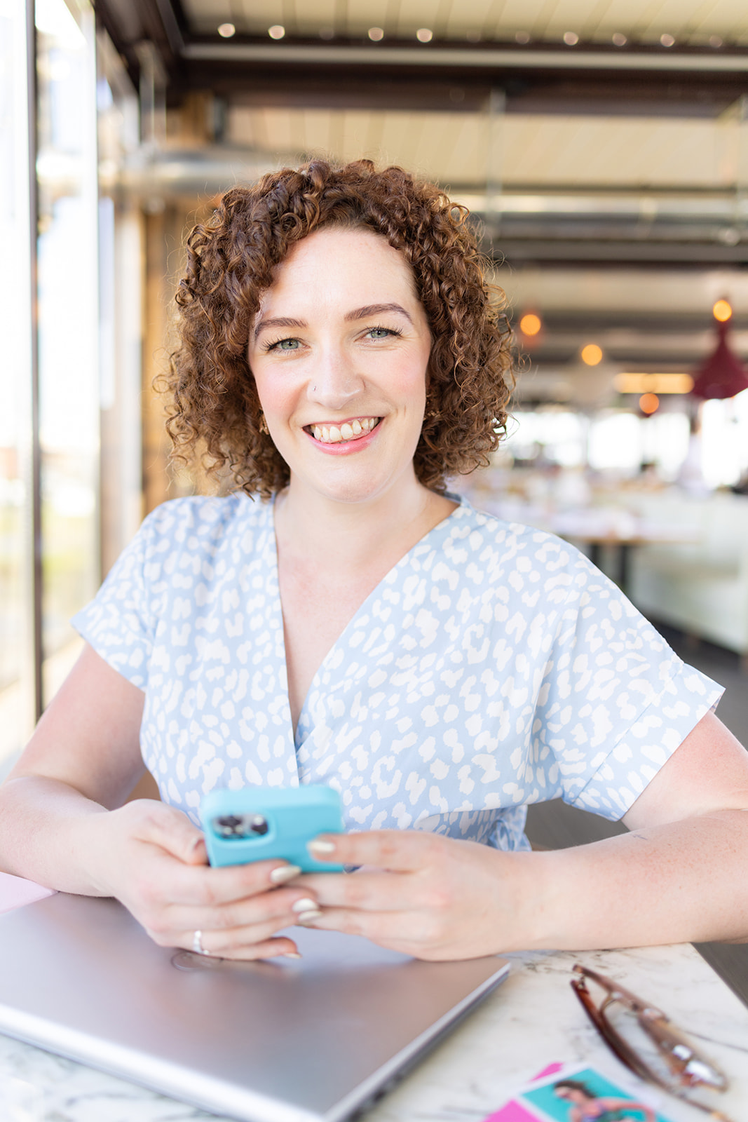 Female personal trainer with curly hair, based in Horsham West Sussex