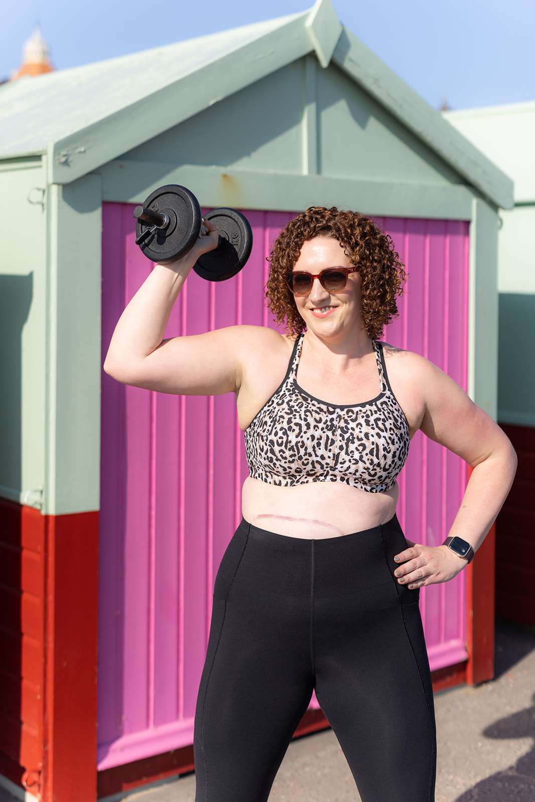 Horsham personal trainer Becky Hughes smiling in gym wear